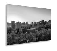 Impression sur toile motif Kasbah rouge argile dans la lumière dorée du soleil couchant Format : 120 x 80 cm Effet : noir et blanc XXL Impression d'art sur châssis Décoration de salon
