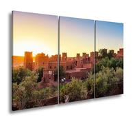 Impression sur toile motif Kasbah rouge argile dans la lumière dorée du soleil couchant Format : 120 x 80 cm (3 pièces) XXL Impression d'art sur châssis Décoration de salon