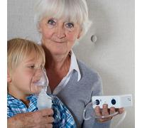Inhalateur à compression portable
