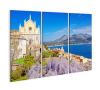 islandburner Impression sur toile - Belle vue sur la côte avec fleurs et église historique - Toile 130 x 80 cm - 3 pièces