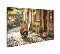 islandburner Impression sur toile Vespa dans une rue pavée pittoresque - Toile 80 x 40 cm