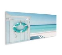 islandburner Tableau sur toile Bouée de sauvetage sur la plage avec eau turquoise et ciel - Panorama