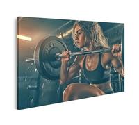 islandburner Tableau sur toile Femme en haltérophilie à la salle de sport en concentration intense Images murales Poster