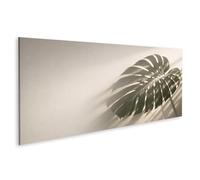 islandburner Tableau sur toile - Ombre dramatique d'une feuille de Monstera pour une décoration murale élégante - Panorama