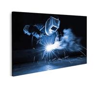 islandburner Tableau sur toile représentant un travail de soudeur dans l'obscurité avec des étincelles et de la fumée dans l'image