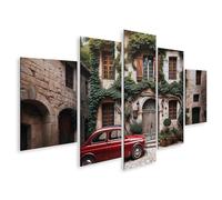 islandburner Tableau sur toile représentant une voiture classique rouge devant un bâtiment historique avec lierre
