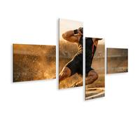 islandburner Tableau sur toile - Tableau mural dynamique d'un athlète qui fait un coup de balle dans le stade - 4 pièces - Edition D1