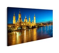 islandburner Tableau sur toile Zaragoza Espagne Vue sur la rivière jusqu'à la cathédrale du soir. Peintures Imprimées Art Poster Mural