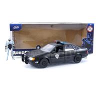 Jada Voiture miniature Ford Tarus 1:24 avec figurine Robocop 1986 noir mat