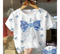 Jeune fille à la mode, décontractée et confortable, t-shirt col rond à manches courtes, design mignon et doux avec nœud en strass bleu, imprimé de nœuds bleus sur tout le t-shirt, t-shirt léger et con