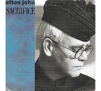 John Elton - Sacrifice / Love Is A Cannibal [Vinyle 45 tours 7"]