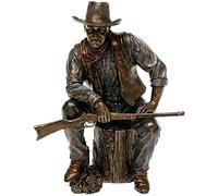 John Wayne Assis sur la Statue de Bronze Connexion