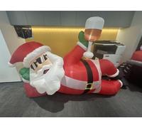 JOYIN Père Noël gonflable couché (270 cm), décoration de Noël amusante pour l'extérieur, éclairée avec LED, grande figurine de jardin de Noël avec lunettes de soleil pour jardin, pelouse et cour
