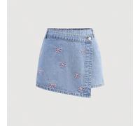 Jupe mini en jean bleu avec nœud rose brodé, style girlish pour adolescentes. Tenue décontractée pour enfants au printemps et en été, style vacances, campagne, boho. Short en jean pour festival rave 1