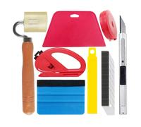 Kit de lissage de papier peint comprenant un rouleau à joint en feutre, une raclette, un mètre ruban et un couteau utilitaire