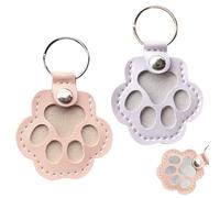KLINNA Lot de 2 porte-clés collecteurs de poils de chien - Pendentif en cuir en forme de patte pour ranger les poils d'animaux - Boîte de souvenirs unique pour animaux de compagnie avec bouton