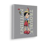 KOMAR Tableau intissé Pinocchio Timide Multicolors