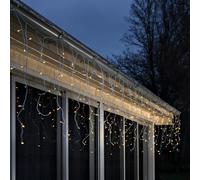 Konstsmide 2777-802SP Rideau lumineux solaire avec 200 diodes ambrées et câble blanc 2 piles au lithium et 1 CR2025 (inclus)