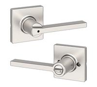 Kwikset Casey - Poignée de porte intérieure avec serrure, levier de porte pour salle de bain et chambre à coucher, serrure tournante réversible sans clé, en nickel satiné, avec protection Microban