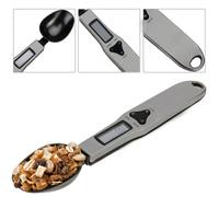 La balance à cuillère numérique calcule le poids en grammes, doseur avec afficha