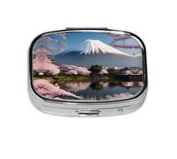 La mini boîte à médicaments carrée est adaptée pour mettre dans les poches ou les portefeuilles. Elle est facile à ouvrir et pratique. Mont Fuji au début du printemps
