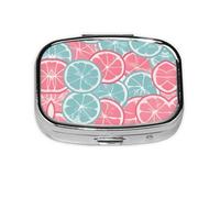 La mini boîte à médicaments carrée est adaptée pour mettre dans les poches ou les portefeuilles. Elle est facile à ouvrir et pratique. Tranches d'agrumes roses et bleues