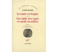 La Route est longue / Une table avec tapis et carafe au milieu