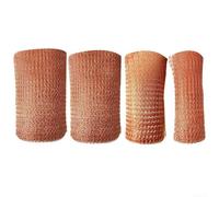 Le filet en cuivre utilisé pour dissuader les escargots, les rongeurs et les insectes d'entrer dans les espaces de jardin peut être coupé aux dimensions requises (127 mm x 12 m)