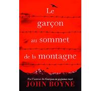 Le garçon au sommet de la montagne