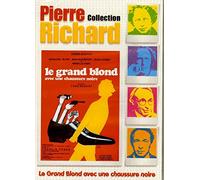 LE GRAND BLOND AVEC UNE CHAUSSURE NOIRE