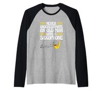 Le Saxophone ne sous-estime jamais Un Vieil Homme avec Un Saxophone Manche Raglan