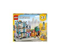 LEGO Jeu de construction La Grand-Rue 31141 – Gratte-ciel, rue de marché, hôtel, café, magasins