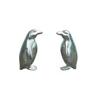 Les Pingouins d'amour : Célébrez Votre Lien Unique avec des Pingouins en Étain et Un Caillou Spécial