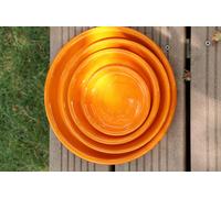 LES POTERIES D'ALBI-Soucoupe en terre cuite émaillée orange Savane Les Poteries d’Albi - diamètre 41 cm