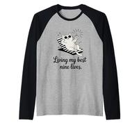 Living My Best Nine Lives Jeu de Mots Amusant pour Chat Manche Raglan