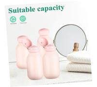 LOLIPPYY 4 pièces Set de Flacons de Voyage Roses Bouteilles Souples Anti-fuite Rechargeables pour Shampoing Lotion et Articles de Toilette Contenants Portables pour Remplissage Avion