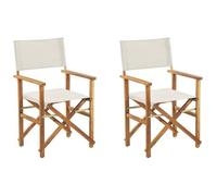 Beliani 2 Chaises Fauteuils Metteur en Scène Pliantes en Bois Acacia Clair avec Accoudoirs et Assise Blanc Cassé Idéales pour Jardin Boho et Rétro