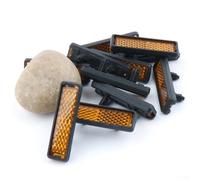 Lot de 4 réflecteurs de pédale de cyclisme pour améliorer la présence du cycliste au crépuscule ou dans des conditions de ciel couvert, compatibles avec une large gamme de types de pédales