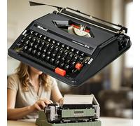 Machine à écrire manuelle classique des années 1980 portable rétro anglais machine mécanique nostalgie traitement de texte pour la maison et le bureau