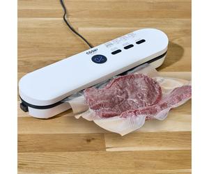 Machine mise sous vide alimentaire - cook concept - pratique - blanc