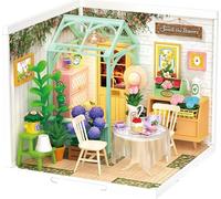 Maison miniature RoboTime Assis avec du thé dans le jardin fleuri