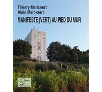 Manifeste (vert) au pied du mur