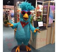 Mascotte Redbrokoly De Coq Turquoise Personnage Costumé Habillé D'un Bermuda Et De Lunettes De Lecture Multicolore