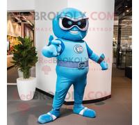 Mascotte Redbrokoly De Personnage De Super-Héros Bleu Habillé D'un Pantalon En Velours Côtelé Et D'un Bracelet Montres Multicolore