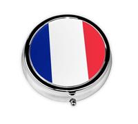 Mini pilulier rond avec drapeau français, léger et portable, avec 3 inserts en plastique, convient pour le transport dans les poches ou les portefeuilles.