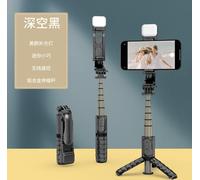 Mini portable Q10s Selfie Stick 10 M sans fil de conception de contrôle à distance intégré multifonctions Bluetooth compatible trépied Q10S tige + Remplir Li