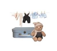 Morris et ses habits dans une valise