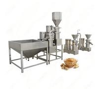 Moulin à beurre d'arachide commercial avec système de refroidissement efficace pour le traitement à haut rendement des pâtes d'amande, de noix de cajou et de sésame dans les lignes de fabrication