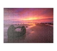 MyPuzzle Les Roches De Moeraki Au Lever du Soleil - La Magie De La Côte Néo-zélandaise - Premium 100 Pièces Puzzle - Collection spéciale MyPuzzle de Puzzle Galaxy
