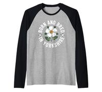 Né et élevé dans Le Yorkshire, White Rose County Manche Raglan